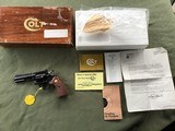 COLT DIAMONDBACK 22LR., 4" BLUE, NEW UNFIRED, UNTURNED, 100% COND. IN FACTORY COSMOLIINE, IN THE BOX - 1 of 4