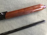 REMINGTON 1100, 410 GA. 25” MOD. VENT RIB, NEW UNFIRED IN THE REMINGTON DUPONT BOX WITH OWNERS MANUAL & WOOD DUCK PLUG - 4 of 8