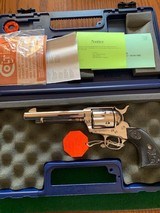 COLT SINGLE ACTION ARMY 44-40 CAL. 5 1/2” BARREL, BRIGHT NICKEL NEW UNFIRED, UNTURNED 100% COND. IN THE BOX - 1 of 4