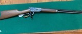 WINCHESTER 94, 357 MAGNUM CAL., CASE COLORED RECEIVER, 20” HEX BARREL, CRESCENT BUTT PLATE, TANG SAFETY, 99% COND. - 1 of 5