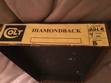 COLT DIAMONDBACK 22 LR., 4” BLUE, NEW UNFIRED, UNTURNED IN FACTORY COSMOLINE, MFG. 1969, IN THE ORIGINAL FACTORY BOX - 4 of 5