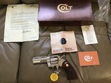 COLT PYTHON 357 MAGNUM, 4” BRIGHT NICKEL, MFG. 1977, NEW UNFIRED UNTURNED IN THE BOX - 1 of 7