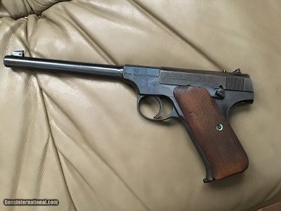COLT WOODSMAN 22 LR. FIRST ISSUE MFG. 1928, VERY HIGH COND. IN THE BOX WITH OWNERS MANUAL, ETC. GUN & BOX NUMBERS ARE THE SAME