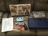 COLT PYTHON 357 MAGNUM, 4” BRIGHT STAINLESS, NEW UNFIRED, UNTURNED IN THE BLUE PLASTIC BOX WITH COLT PICTURE BOX - 1 of 4