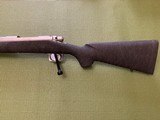 REMINGTON 700 7MM RUM CAL.,26” BARREL, 99+% COND. - 2 of 5