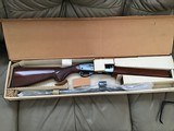 REMINGTON 1100, 410 GA., 25” MOD., 3” CHAMBER, VENT RIB, NEW UNFIRED, 100% COND. IN THE REMINGTON DUPONT BOX - 1 of 5