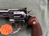 COLT PYTHON 357 MAGNUM WITH EXTREMELY RARE 8” BARREL IN BRIGHT NICKEL, MFG. 1981, APPEARS UNFIRED AFTER LEAVING THE FACTOR,100% COND. IN THE BOX - 4 of 8