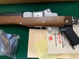 RUGER MINI-14, 223 CAL. STAINLESS, SIDE FOLDING STOCK, BAYONET LUG, FLASH HIDER, UNFIRED 100% COND. NEW IN THE BOX WITH OWNERS MANUAL, ETC. - 4 of 6