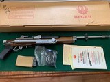RUGER MINI-14, 223 CAL. STAINLESS, SIDE FOLDING STOCK, BAYONET LUG, FLASH HIDER, UNFIRED 100% COND. NEW IN THE BOX WITH OWNERS MANUAL, ETC. - 1 of 6