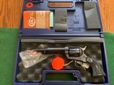 COLT SAA, 44-40 CAL., 5 1/2” BARREL, BLUE/CASE COLOR, 100% COND. NEW IN THE BOX - 1 of 4