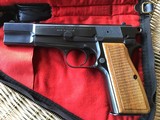 BROWNING HI POWER 9MM, MFG. 1969, HAS POPULAR RING HAMMER, NEW UNFIRD, 100% COND. IN THE BROWNING ZIPPER CASE - 1 of 3