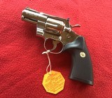 COLT PYTHON 357 MAGNUM, 2 1/2” BRIGHT STAINLESS,
NEW UNFIRED, UNTURNED, 100% COND. IN THE ORIGINAL BOX - 2 of 6