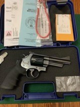 SMITH & WESSON 29,
44 MAGNUM, 4” BLUE, “MOUNTAIN GUN” CABELAS OUTFITTER SERIES IN THE BOX - 1 of 6