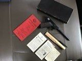 COLT TARGET WOODSMAN 6” BLUE, MFG. 1921, LIKE NEW IN THE BOX WITH OWNERS MANUAL, CLEANING BRUSH IN ENVELOPE, ETC. - 1 of 6