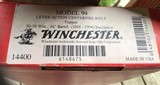WINCHESTER 94, “TRAPPER” 30-30 CAL., 16” BARREL, 1894-1994 INSCRIPTION, NEW UNFIRED IN THE BOX WITH HANG TAG & PAPERS - 9 of 9