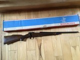 WINCHESTER 70 DELUXE 22-250 CAL., HAS JEWELED BOLT, HAS FANTASTIC FIDDLE FIGURE MONTE CARLO WALNUT WOOD, 99+% COND. IN THE BOX - 1 of 12