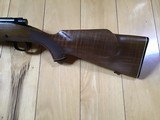 WINCHESTER 70 DELUXE 22-250 CAL., HAS JEWELED BOLT, HAS FANTASTIC FIDDLE FIGURE MONTE CARLO WALNUT WOOD, 99+% COND. IN THE BOX - 3 of 12