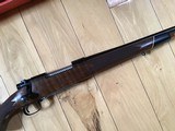 WINCHESTER 70 DELUXE 22-250 CAL., HAS JEWELED BOLT, HAS FANTASTIC FIDDLE FIGURE MONTE CARLO WALNUT WOOD, 99+% COND. IN THE BOX - 4 of 12