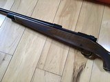 WINCHESTER 70 DELUXE 22-250 CAL., HAS JEWELED BOLT, HAS FANTASTIC FIDDLE FIGURE MONTE CARLO WALNUT WOOD, 99+% COND. IN THE BOX - 7 of 12
