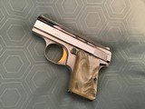 BROWNING BELGIUM “BABY” 25 AUTO IN RARE BRIGHT NICKEL WITH GOLD TRIGGER, NEW UNFIRED 100% COND. IN THE BROWNING ZIPPER CASE - 3 of 3