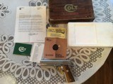 COLT SERIES 70 GOVERNMENT, 45 ACP., BRIGHT NICKEL, APPEARS UNFIRED IN THE BOX WITH OWNERS MANUAL ETC. - 1 of 5