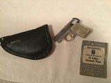 BROWNING BELGIUM BABY 25 AUTO, SCARCE BRIGHT NICKEL, AS NEW UNFIRED, IN THE BROWNING ZIPPER POUCH WITH OWNERS MANUAL - 1 of 3
