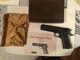 COLT 1911, 38 SUPER CAL., MFG. 1968, AS NEW IN THE BOX, WITH OIL PAPER & OWNERS MANUAL - 1 of 6