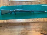 REMINGTON 700 XCR 375 ULTRA MAG., 24” BARREL WITH MUZZLE BREAK, EXC. COND. - 1 of 5
