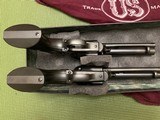 U. S. FIRE ARMS MFG. CO. RODEO MODEL 45 LC. 4 3/4” BARRELS, NEW UNFIRED IN THE BOXES - 4 of 6