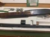 REMINGTON 1100 SPORTING 28 GA., 25” INVECTOR, COMES WITH 3 CHOKE TUBES & WRENCH, STILL IN FACTORY GREASE, AS NEW IN THE BOX - 2 of 6