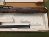 REMINGTON 1100 SPORTING 28 GA., 25” INVECTOR, COMES WITH 3 CHOKE TUBES & WRENCH, STILL IN FACTORY GREASE, AS NEW IN THE BOX - 3 of 6