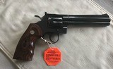 COLT PYTHON 357 MAGNUM, “ELITE” 6” “ROYAL BLUE” UNTURNED AFTER LEAVING THE FACTORY, NO TURN LINE, 100% COND. FACTORY TEST TARGET, IN THE BOX. - 3 of 7