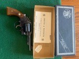 SMITH & WESSON MODEL 10-5, 38 SPC., 4” BLUE, COMES WITH OWNERS MANUAL, LIKE NEW IN THE BOX - 1 of 4