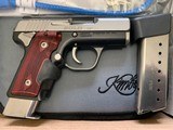 KIMBER 9 MM SOLO CDP KIMBER CUSTOM SHOP GUN, ROSEWOOD GRIPS, AS NEW WITH 2 FACTORY MAG’S., POUCH, OWNERS MANUAL, ETC. IN THE BOX - 3 of 4