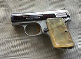 BROWNING BELGIUM BABY 25 AUTO RARE BRIGHT NICKEL, GOLD TRIGGER, PEARLITE GRIPS, NEW 100% COND., UNFIRED IN THE BOX WITH OWNERS MANUAL - 4 of 4