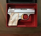 BROWNING BELGIUM BABY 25 AUTO RARE BRIGHT NICKEL, GOLD TRIGGER, PEARLITE GRIPS, NEW 100% COND., UNFIRED IN THE BOX WITH OWNERS MANUAL - 2 of 4