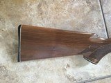REMINGTON 1100, LEFT HAND 20 GA. 26” IMPROVED CYLINDER, VENT RIB, MFG. 1972, NEW UNFIRED, 100% COND. IN THE REMINGTON DUPONT BOX - 8 of 9