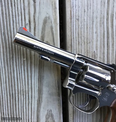 SMITH & WESSON 34-1, 22/32 KIT GUN, 22 LR. 4” NICKEL NEW UNFIRED IN THE BOX WITH OWNERS MANUAL - Image 4 of 5