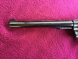 SMITH & WESSON 17-4, 22 LR. 8 3/8” BLUE, LOOKS BRAND NEW IN THE BOX WITH OWNERS MANUAL & CLEANING TOOLS IN PLASTIC & OIL PAPER - 7 of 10