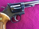 SMITH & WESSON 17-4, 22 LR. 8 3/8” BLUE, LOOKS BRAND NEW IN THE BOX WITH OWNERS MANUAL & CLEANING TOOLS IN PLASTIC & OIL PAPER - 4 of 10