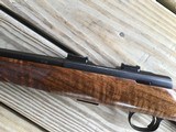 COOPER 57M, 22 LR. VERY FANCY AAA WALNUT, IN THE BOX WITH TEST TARGET, OWNERS MANUAL, EXTRA COOPER MAGAZINE, ETC. - 3 of 9