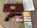 COLT PYTHON 357 MAGNUM, 6” ROYAL BLUE, MFG. 1981, IN THE BOX WITH OWNERS MANUAL, HANG TAG, COLT LETTER, ETC. - 1 of 9