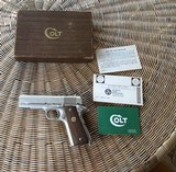 SOLD——COLT SERIES 70, COMBAT COMMANDER 45 ACP, IN RARE SATIN NICKEL, VERY SCARCE GUN, NEW UNFIRED 100% COND. IN THE BOX WITH OWNER MANUAL, ETC. - 1 of 6