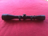 LEUPOLD VARIABLE 3X-9X, DUPLEX CROSSHAIRS, LEUPOLD RINGS - 1 of 2