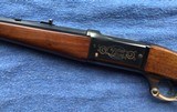 SAVAGE 1895 “75TH ANNIVERSARY” 308 CAL., OCTAGON BARREL, BRASS BUTT PLATE, PLATED LEVER, 75 ANNIVERSARY MEDALLION IN THE STOCK - 4 of 7