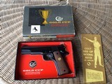 COLT PRE SERIES 70 GOLD CUP, 38 SPC. MID RANGE CAL. MFG. 1963, APPEARS UNFIRED 100% COND., IN FACTORY COSMOLINE, IN THE GOLD CUP BOX WITH EXTRA MAG. - 1 of 4