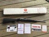 RUGER 77/357, 357 MAGNUM CAL., 18 1/2” STAINLESS BARREL, SYNTHETIC STOCK, NEW UNFIRED, 100% COND. IN THE BOX WITH OWNERS MANUAL - 1 of 10