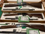 REMINGTON 1100, SAM WALTON 3 GUN SET, 12 GA., 20 GA. & 28 GA. ALL NIB, WITH OWNERS MANUALS, CHOKE TUBES & WRENCHES. - 2 of 3