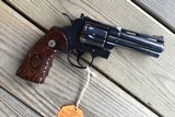 COLT PYTHON 357 MAGNUM
“ELITE” 4” ROYAL BLUE, NEW IN THE BOX WITH OWNERS MANUAL, HANG TAG, COLT LETTER, ETC. - 2 of 10