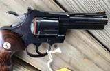 COLT PYTHON 357 MAGNUM
“ELITE” 4” ROYAL BLUE, NEW IN THE BOX WITH OWNERS MANUAL, HANG TAG, COLT LETTER, ETC. - 8 of 10